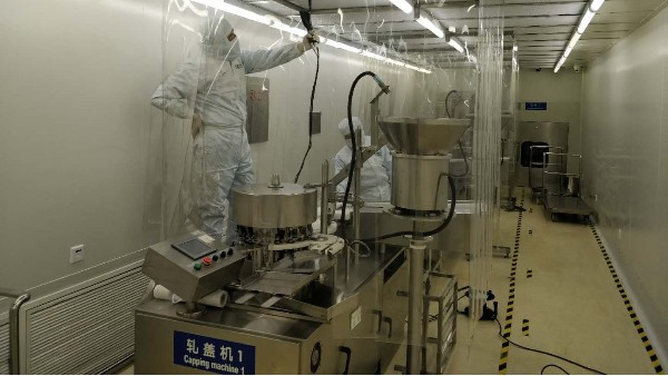 上海达沃在武汉生物研究所进行轧盖机环境的要求确认测试